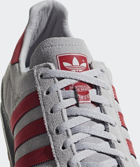 grey and red adidas jeans