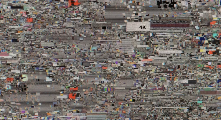 Beispiel eines Bildschirms, auf dem ein Bild mit extrem vielen Artefakten zu sehen ist.