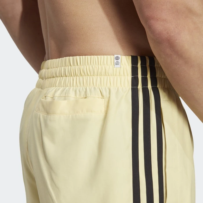 adidas Originals Adicolor 3-Streifen Badeshorts almost yellow/black (Herren)