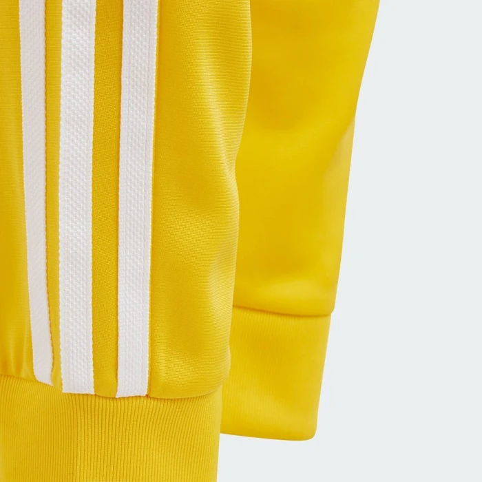 adidas Adicolor SST Trainingshose lang bold gold (Junior)