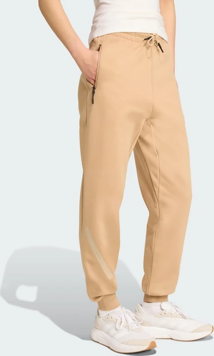 adidas Z.N.E. Trainingshose lang warm sandstone (Damen)
