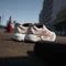 adidas Adizero Adios Pro 4 chalk white/warm sandstone/semi impact orange (Damen) Vorschaubild