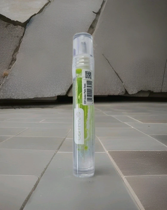 Catrice Poolside of Life Bi-Phase Lip Oil C01 under palm trees, 3.6ml