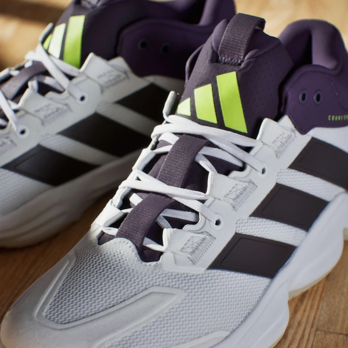adidas Court Stabil cloud white/aurora met/aurora plum (Herren)