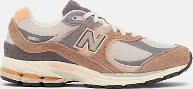 New Balance 2002R mushroom/hazy peach/castlerock (Herren)