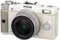 Pentax Q weiß mit Objektiv Q 02 Standard Zoom 5-15mm 2.8-4.5 AL Vorschaubild