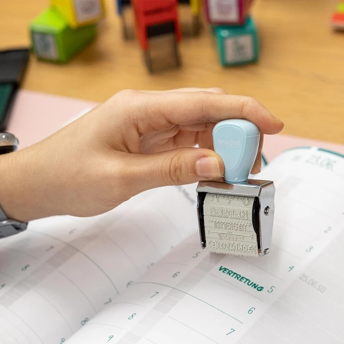 trodat Creative Mini Handstempel mit 12 Abdrucken "Schulplaner" inkl. 3-farbigem Kissen, 30x5mm, pastell blau, 2er-Set