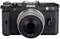 Pentax Q schwarz mit Objektiv Q 01 Standard Prime 8.5mm 1.9 AL und Q 02 Standard Zoom 5-15mm 2.8-4.5 AL Vorschaubild