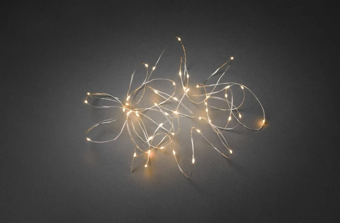 Konstsmide Tropfen-Lichterkette silber LED 50x bernstein