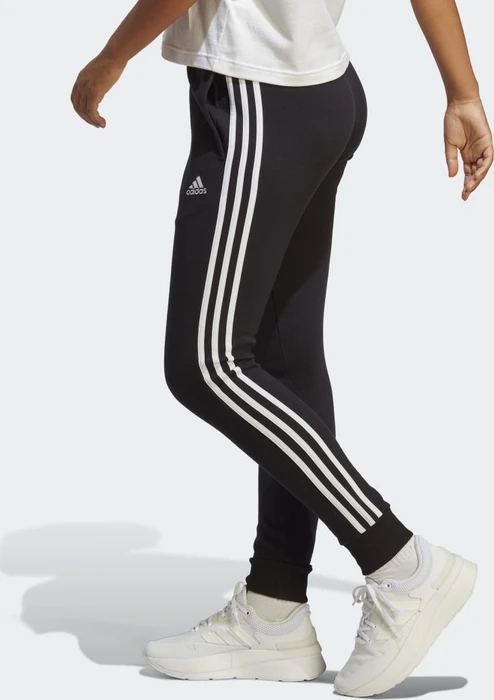 adidas Essentials 3-Streifen French Terry Cuffed Trainingshose lang schwarz/weiß (Damen)