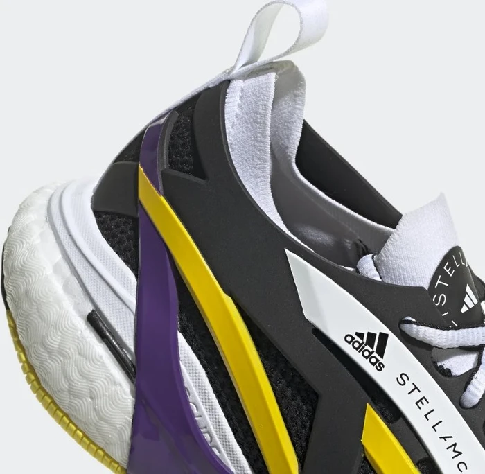 adidas Solar Glide by Stella McCartney core black/active purple/shock yellow (Damen)