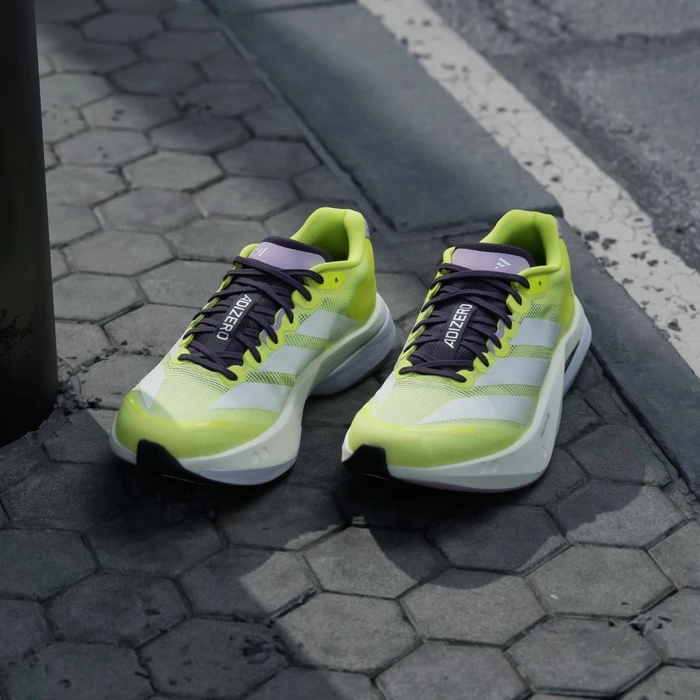 adidas Adizero Boston 13 solar yellow/cloud white/powder plum (Damen)