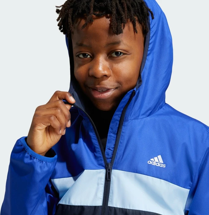 adidas Wind.RDY Tiberio Jacke semi lucid blue/clear sky/legend ink (Junior)