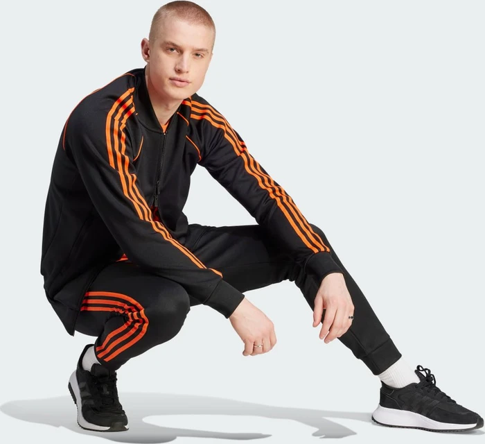 adidas Adicolor Classics SST Originals Trainingsjacke black/semi impact orange (Herren)