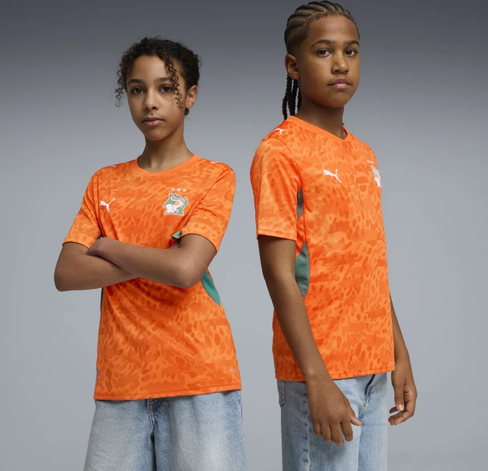 Puma FIFA WM 2026 Elfenbeinküste Heimtrikot kurzarm rickie orange/sport green (Junior)