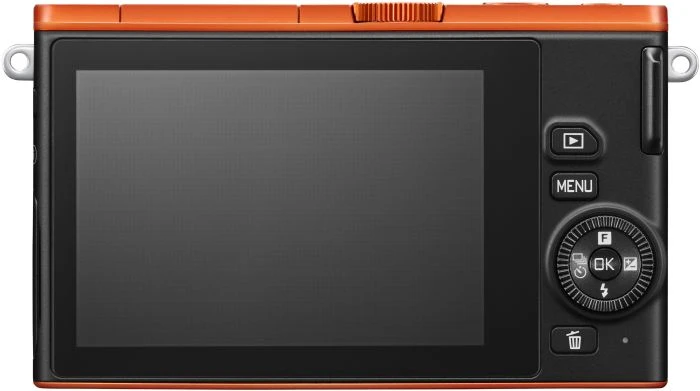 Nikon 1 J4 orange mit Objektiv 1 NIKKOR 10-30mm 3.5-5.6 PD-Zoom VR