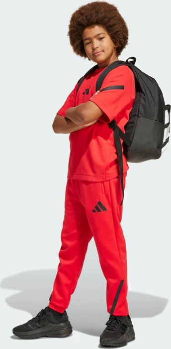 adidas Tapered-Leg Z.N.E. Trainingshose lang pure ruby/black (Junior)