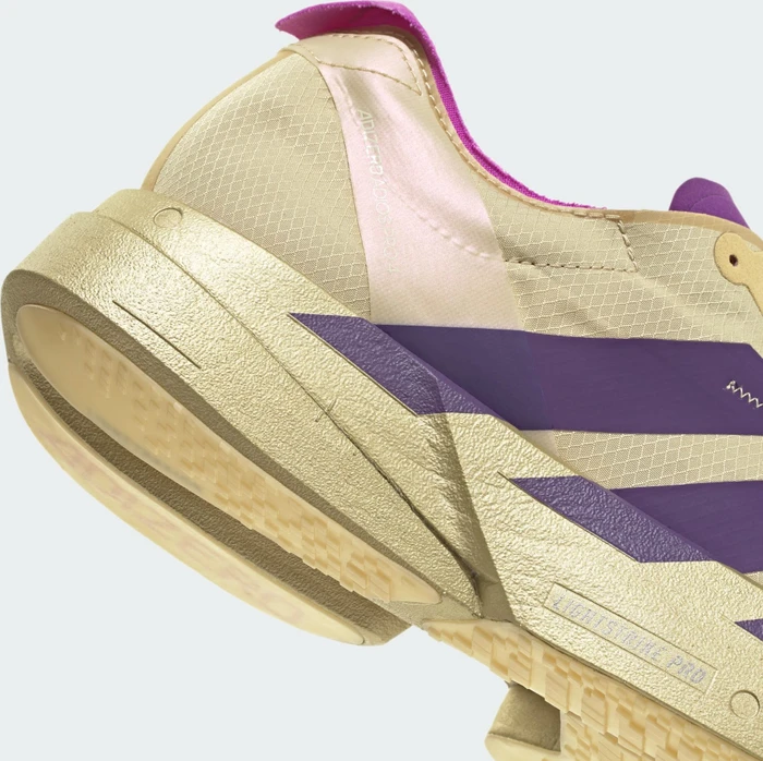 adidas Adizero Adios Pro 4 sand/rich purple/gold metallic (Herren)