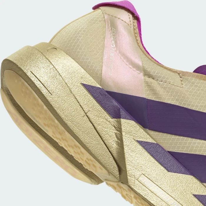 adidas Adizero Adios Pro 4 sand/rich purple/gold metallic (Damen)