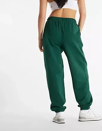 New Balance Athletics French Terry Trainingshose lang nightwatch green (Damen)