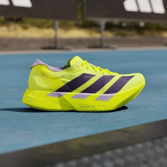 adidas Adizero Adios Pro 4 solar yellow/aurora plum/powder plum (Damen)