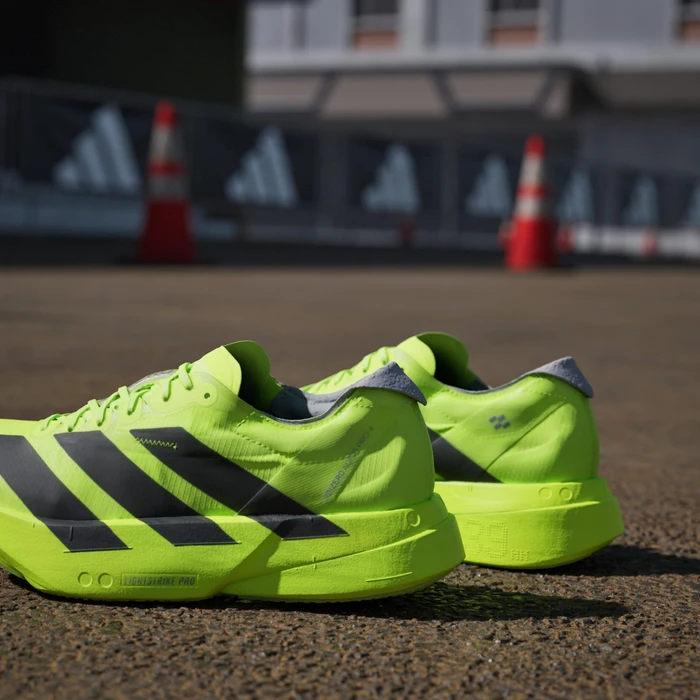 adidas Adizero Adios Pro 4 lucid lemon/core black/halo silver (Damen)