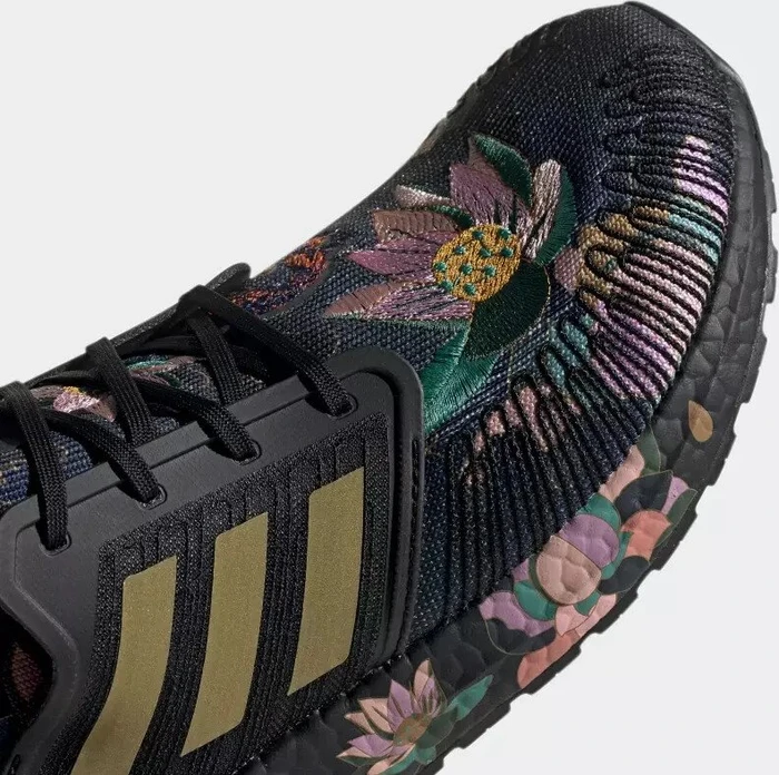 adidas Ultraboost 20 core black/gold metallic/signal coral (Herren)