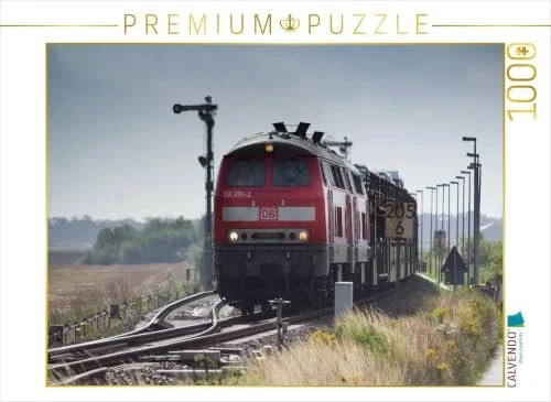 Calvendo 218 376 und Schwester verlassen mit einem DB-Autozug die Ausweichstelle bei Klanxbüll