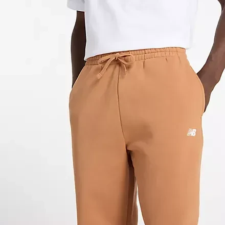 New Balance Sports Essentials Fleece Trainingshose lang walnut (Herren)