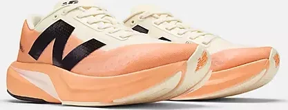 New Balance FuelCell Rebel v4 hot mango/angora/black (Damen)