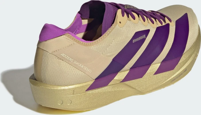adidas Adizero Takumi Sen 11 sand/rich purple/gold metallic (Herren)