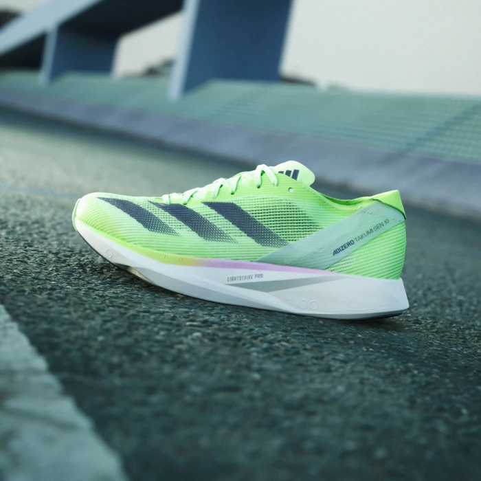 adidas Adizero Takumi Sen 10 green spark/aurora metallic/lucid lemon (Damen)