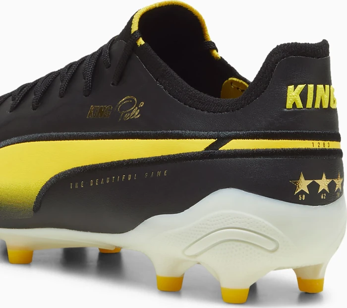Puma King Ultimate Pelé FG/AG puma black/puma white/pelé yellow/puma gold (Damen)