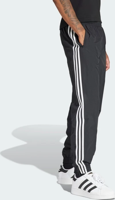 adidas Adicolor Woven Firebird Trainingshose lang schwarz (Herren)