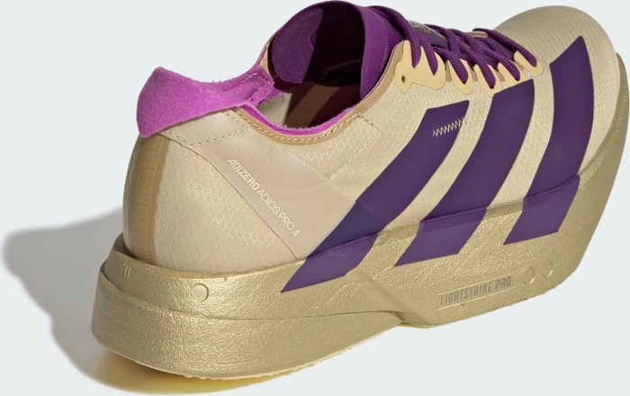 adidas Adizero Adios Pro 4 sand/rich purple/gold metallic (Damen)