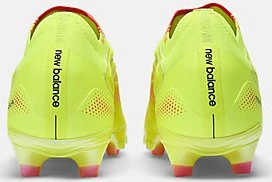 New Balance Tekela Elite Low Laced FG V5 1ST Edition hi-lite/energy red (Herren)