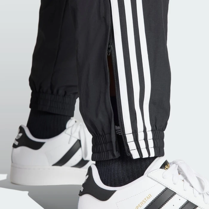 adidas Adicolor Woven Firebird Trainingshose lang schwarz (Herren)