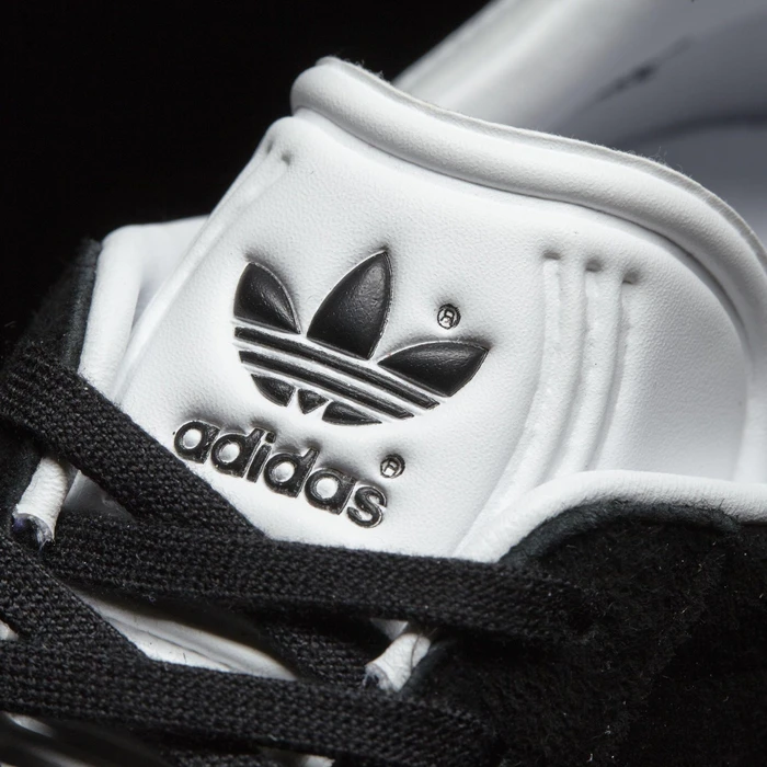adidas Gazelle core black/white/gold met (Herren)