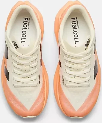 New Balance FuelCell Rebel v4 hot mango/angora/black (Damen)