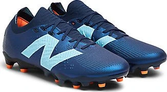 New Balance Tekela Elite Low Laced FG V5 1ST Edition nb navy/team sky blue/hot mango (Herren)