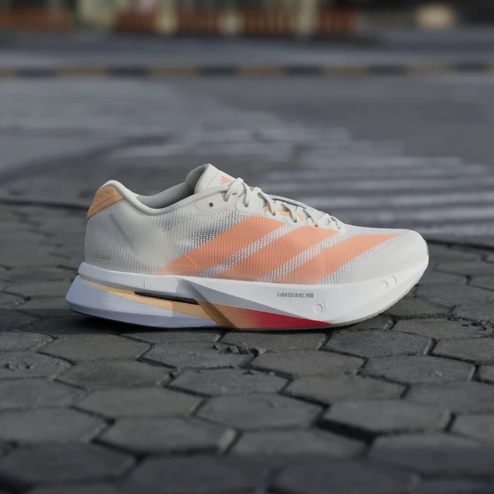 adidas Adizero Boston 13 off white/beam orange/acid orange (Damen)
