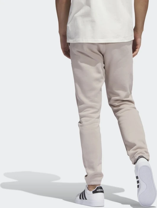 adidas Lounge Fleece Trainingshose lang wonder taupe (Herren)