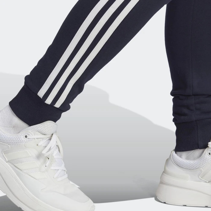 adidas Essentials 3-Streifen French Terry Cuffed Trainingshose lang legend ink/white (Damen)