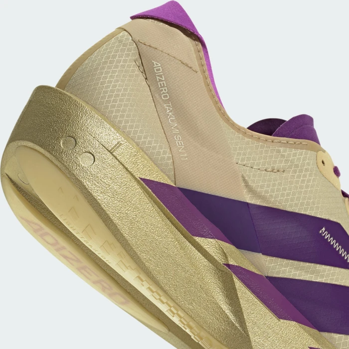 adidas Adizero Takumi Sen 11 sand/rich purple/gold metallic (Herren)