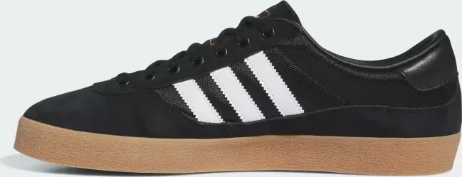 adidas Puig Indoor core black/cloud white/gum (Herren)