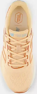 New Balance Fresh Foam 680v7 peach blossom/team sky blue/infield Clay (Damen)