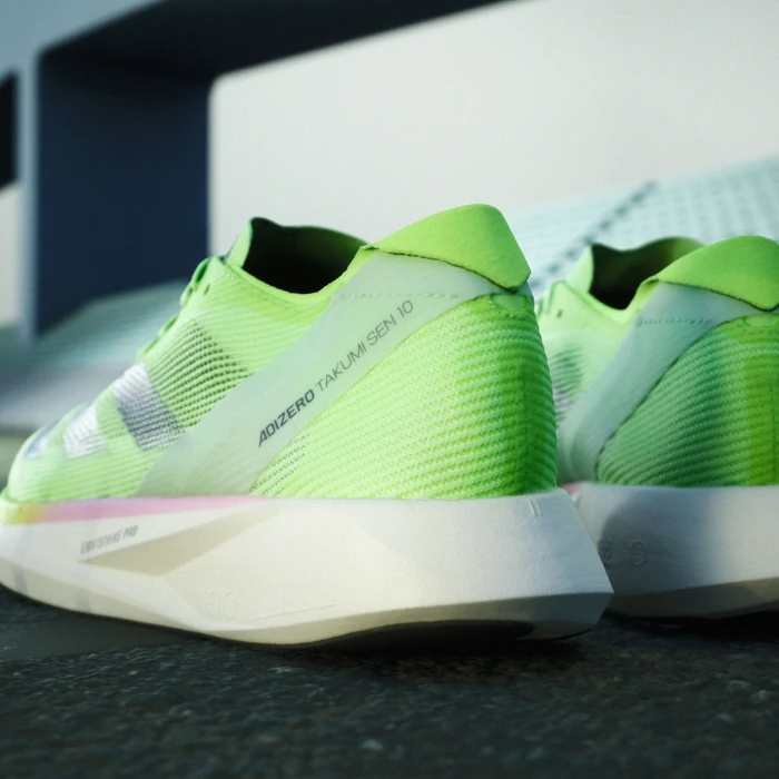 adidas Adizero Takumi Sen 10 green spark/aurora metallic/lucid lemon (Damen)