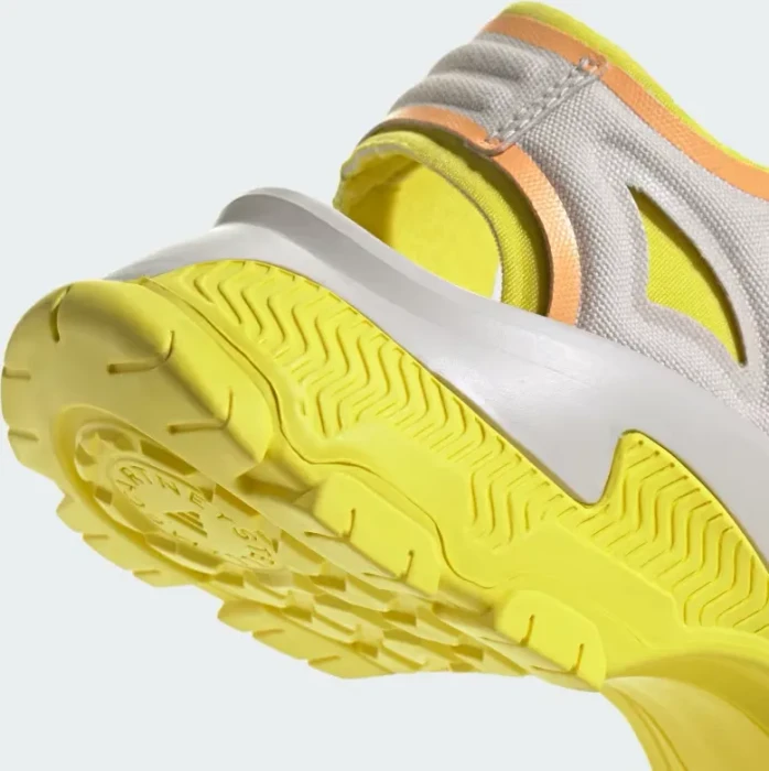 adidas by Stella McCartney Hika chalk pearl/bright yellow/hazy orange (Damen)