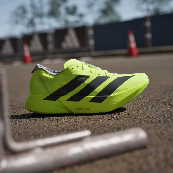 adidas Adizero Adios Pro 4 lucid lemon/core black/halo silver (Herren)