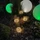 Haushalt International LED Solar Crackle Glaskugel mit Erdspieß schwarz LED 20x warmweiß, 4 Stück (70395)